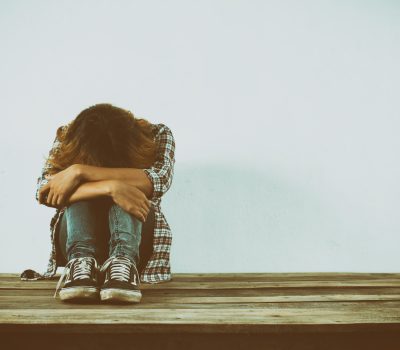 Sad woman hug her knee,nobody